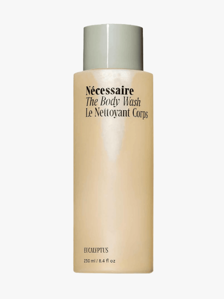 Nécessaire The Body Wash in branded component on a light gray background